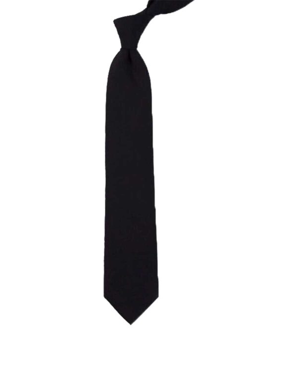 Black neck tie elegantly hanging on a polished wooden hanger.