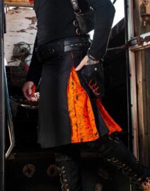 A side profile of the Spooky Spider Kilt, emphasizing the kilt’s sleek pleating and smooth fabric. The detailed spider web patterns continue on the side, adding texture and depth, while the kilt’s durable material hangs perfectly, offering both style and comfort.