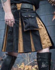 Side view of the Hybrid Cargo Kilt Black & Gold, highlighting the spacious cargo pockets and durable, breathable fabric for easy movement and convenience.