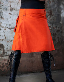 A modern Orange Utility Kilt displayed from the front, showcasing its adjustable waist, silver buckle details, and rugged fabric. The utility-style design offers practicality without compromising on style.