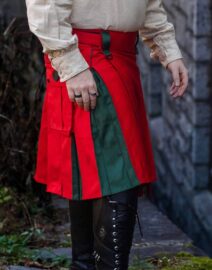 Front view of the Hybrid Cargo Kilt Red/Green, showcasing the bold red and green design with spacious cargo pockets.